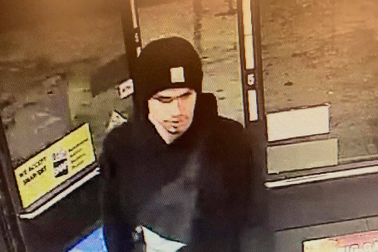 This surveillance video image released by the Yakima Police Department shows a suspect sought in a shooting at a convenience store in Yakima, early on Tuesday. At least three people were killed in a random shooting Tuesday, in Yakima, and police are still searching for the suspect. (Yakima Police Department via AP).