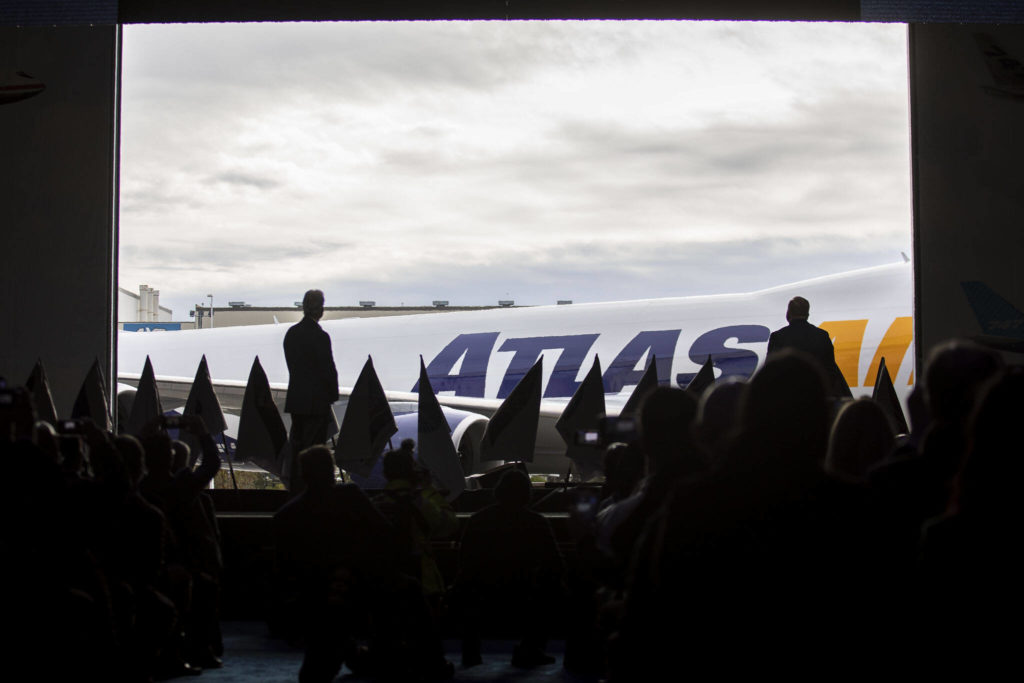 The final 747 is revealed during a celebration on Tuesday, in Everett. The plane was rolled out Dec. 6 from the Everett assembly factory and delivered to the customer, Atlas Air. (Annie Barker / The Herald)
