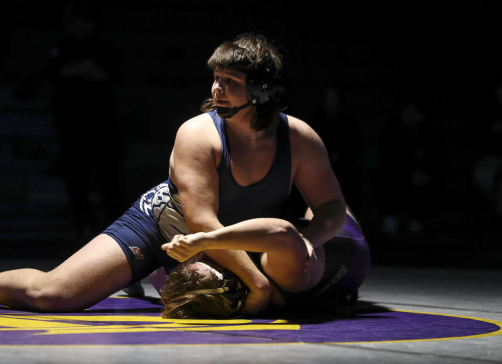 Lake Stevens’ Bryce Slezak and Glacier Peak’s Connor Aney wrestle during the 285 pound weight class match at Lake Stevens High School on Thursday Jan. 26, 2023. (Annie Barker / The Herald)

