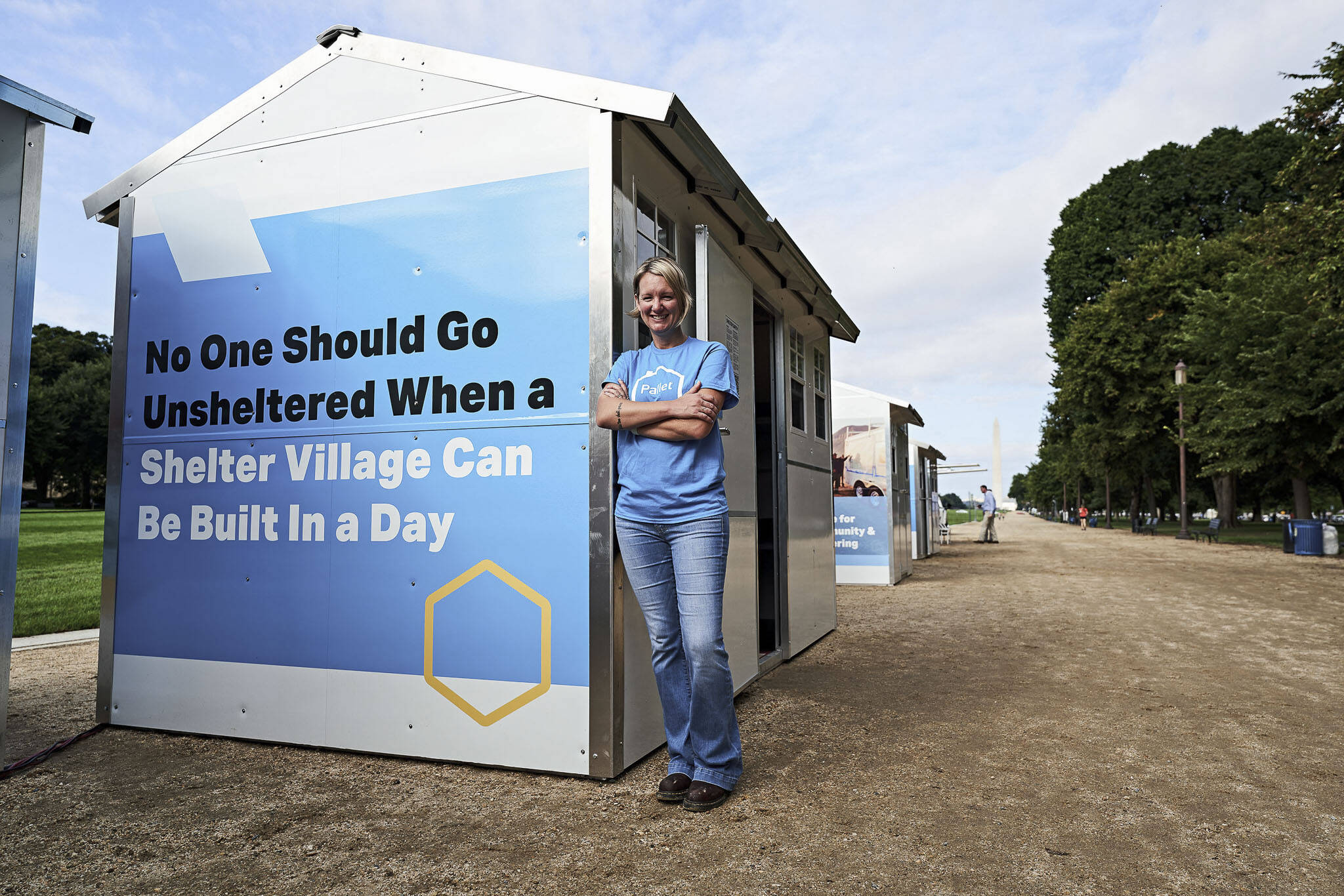 CEO Amy King standing outside of a Pallet shelter. (Courtesy of Pallet)