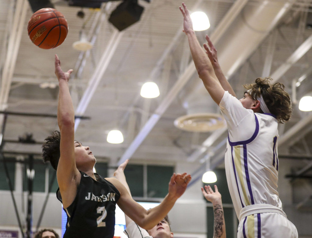 Jackson’s Harris Kampe (2) shoots the ball during a game against Lake Stevens on Tuesday in Lake Stevens. Jackson won 87-69. (Annie Barker / The Herald)
