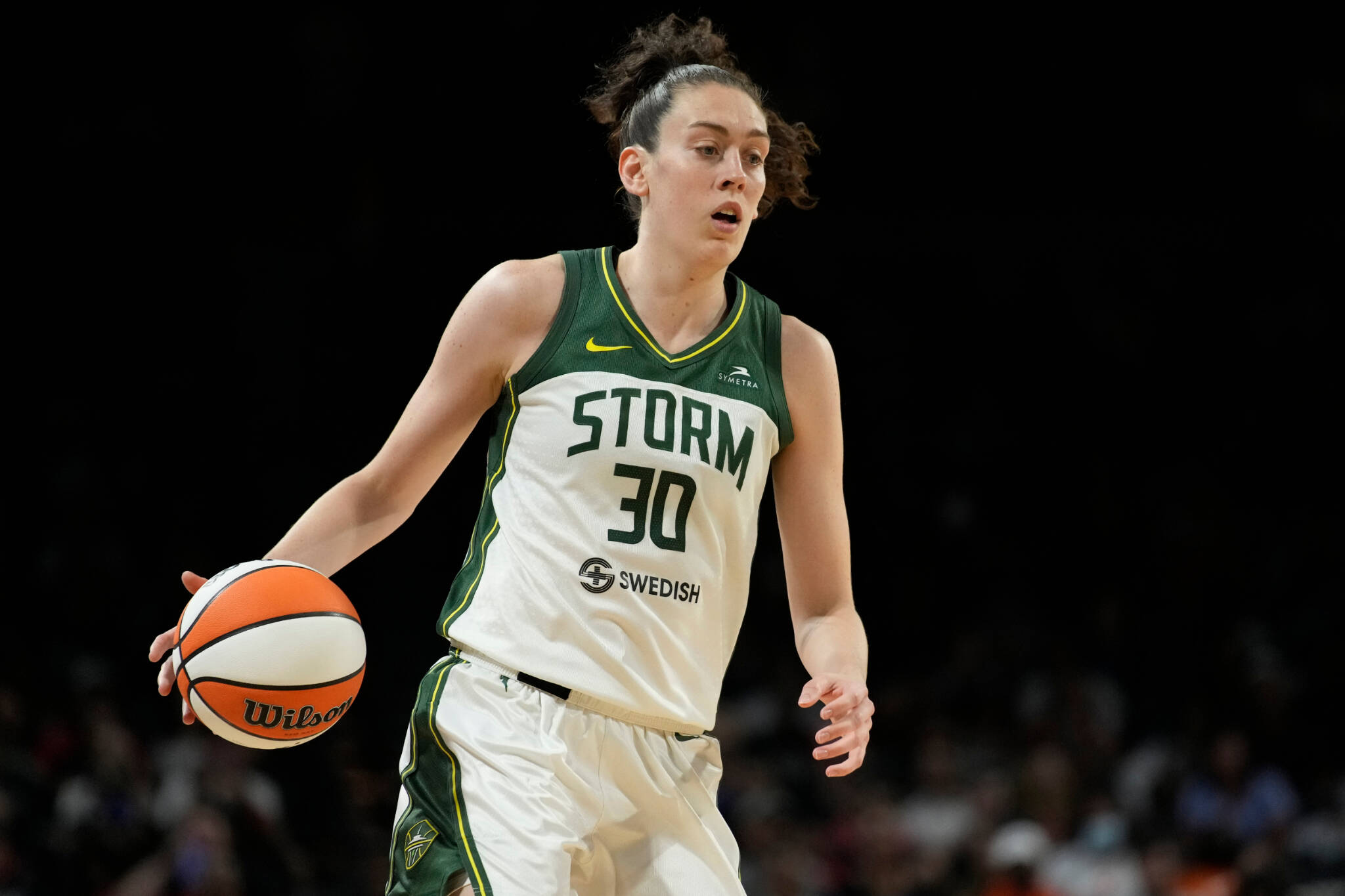 Storm forward Breanna Stewart brings the ball up during a playoff semifinal game against the Aces on Aug. 31, 2022, in Las Vegas. (AP Photo/John Locher)