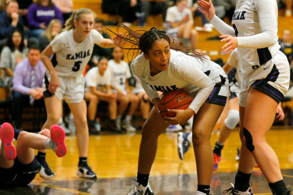 Kamiak’s Jianna Pineda comes down with a rebound against Glacier Peak on Wednesday, Feb 1, 2023, at Kamiak High School in Mukilteo, Washington. (Ryan Berry / The Herald)
