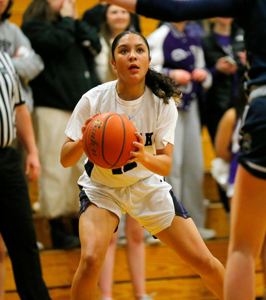 Kamiak’s Vivian Mawudeku side steps to make space for a jumper against Glacier Peak on Wednesday, Feb 1, 2023, at Kamiak High School in Mukilteo, Washington. (Ryan Berry / The Herald)
