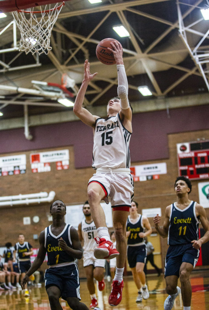 Mountlake Terrace’s Jaxon Dubiel makes a layup during the game against Everett on Jan. 17 in Mountlake Terrace. The defending 3A District 1 champion Hawks enter this year’s tournament with the top seed. (Olivia Vanni / The Herald)
