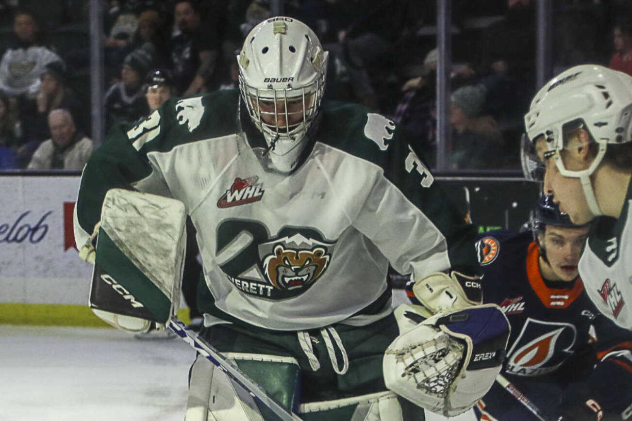 Silvertips’ Tyler Palmer (31) and Ty Gibson (6) defend the goal during a game between the Silvertips and Kamloops Blazers at the Angel of the Winds Arena on Friday, Jan. 13, 2023. The Silvertips fell to the Kamloops, 3-6. (Annie Barker / The Herald)