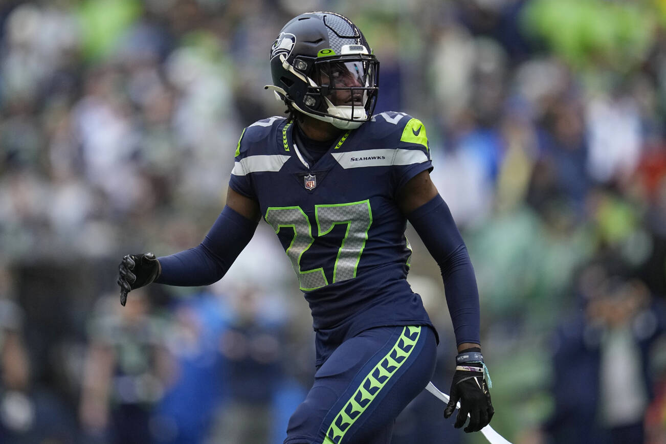 Seattle Seahawks cornerback Tariq Woolen (27) defends down the field during the first half of an NFL football game against the Los Angeles Rams, Sunday, Jan. 8, 2023, in Seattle. (AP Photo/Abbie Parr)