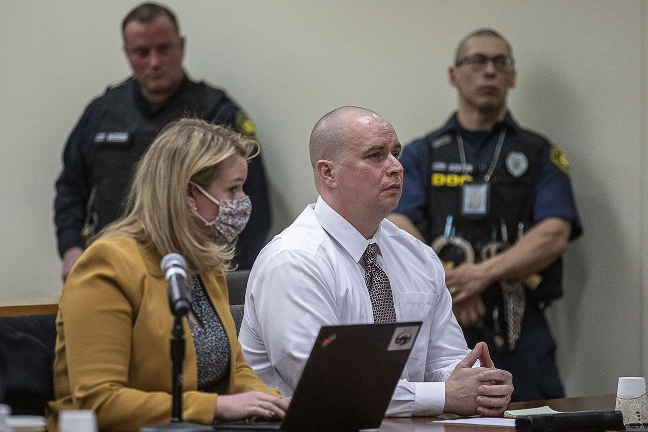 Brandon White listens during his resentencing hearing at the Snohomish County Courthouse in Everett, Washington on Friday, Feb. 24, 2023. (Annie Barker / The Herald)