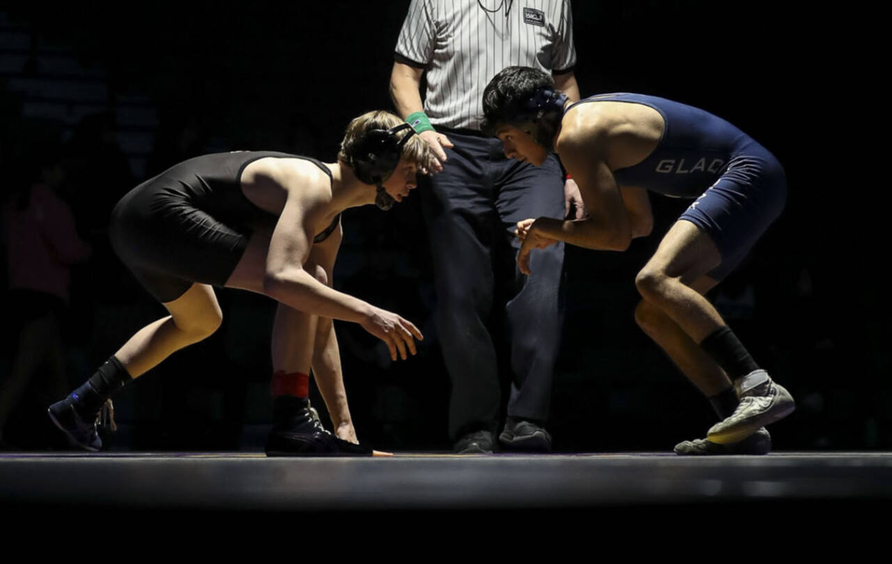 Lake Stevens’ Jacob Christianson (left) is the second-ranked wrestler in Class 4A at 113 pounds. (Annie Barker / The Herald)