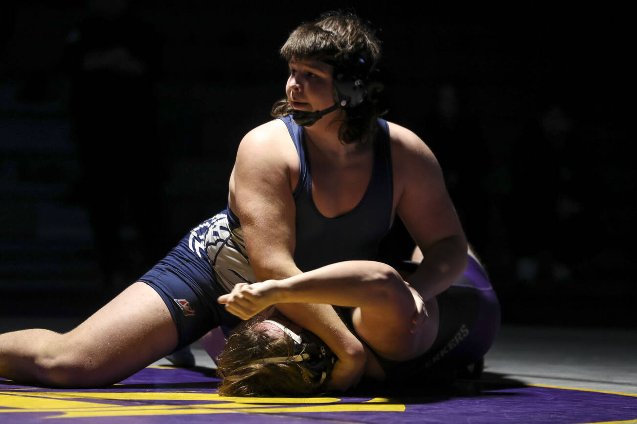 Lake Stevens’ Bryce Slezak and Glacier Peak’s Connor Anney wrestle during the 285 pound weight class match at Lake Stevens High School on Thursday Jan. 26, 2023. (Annie Barker / The Herald)