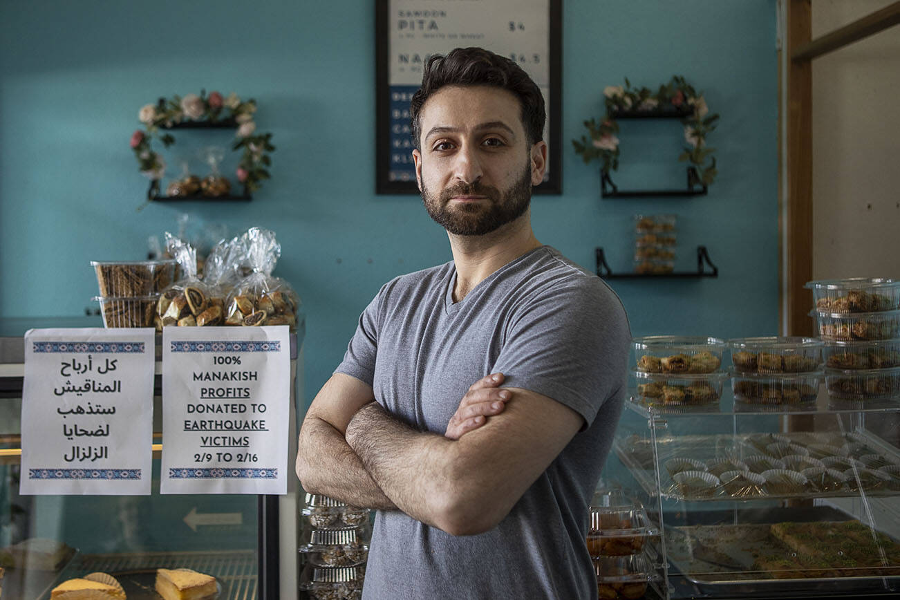 Nechirvan Zebari poses for a photo at Alida's Bakery in Everett, Washington on Friday, Feb. 10, 2023. All manakish profits from Feb. 9 to Feb. 16 will be donated to help earthquake victims in Syria and Turkey. (Annie Barker / The Herald)
