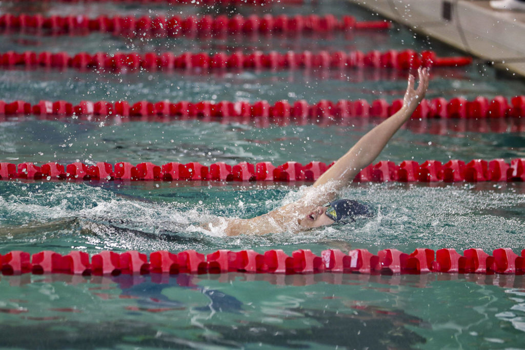 Mariner’s Vyron Domingo wins Heat 2 of the 200 Yard IM during the 4A District 1 swim and dive championships at Snohomish Aquatic Center, in Snohomish, Washington on Saturday, Feb. 11, 2023. (Annie Barker / The Herald)
