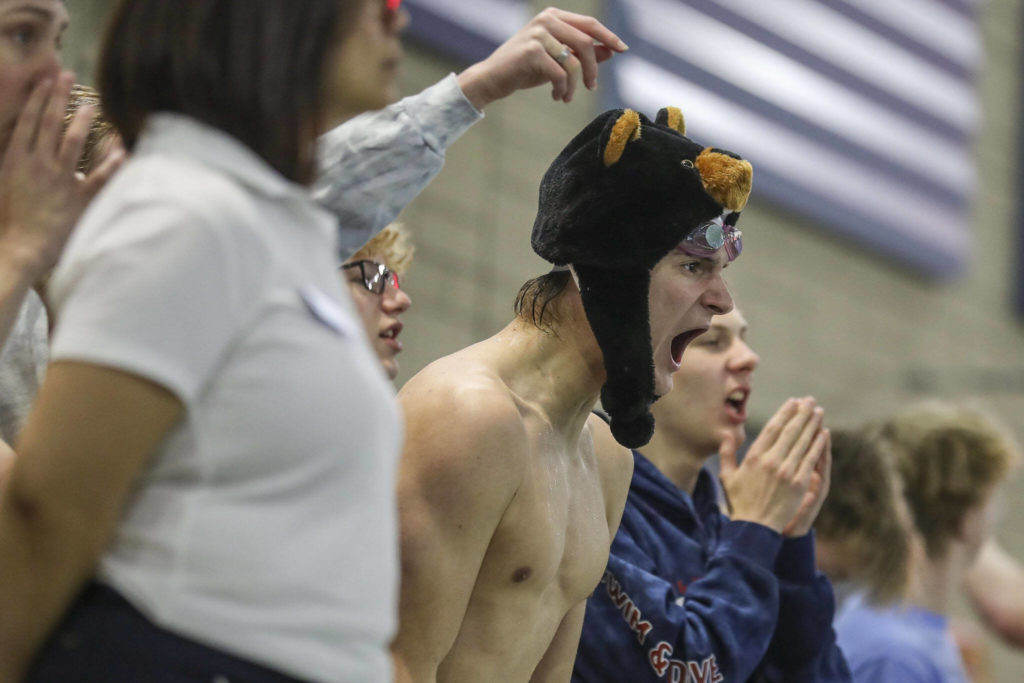 A swimmer cheers during the 3A District 1 swim and dive championships at Snohomish Aquatic Center, in Snohomish, Washington on Saturday, Feb. 11, 2023. (Annie Barker / The Herald)
