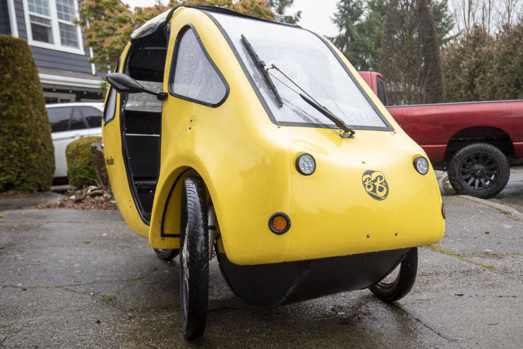 Paula Townsell and Chris Glans bought their PEBL used off Craigslist from a seller in Anacortes in 2020 for $7,900. PEBL is made by the Massachusetts company BetterBike. (Annie Barker / The Herald)
