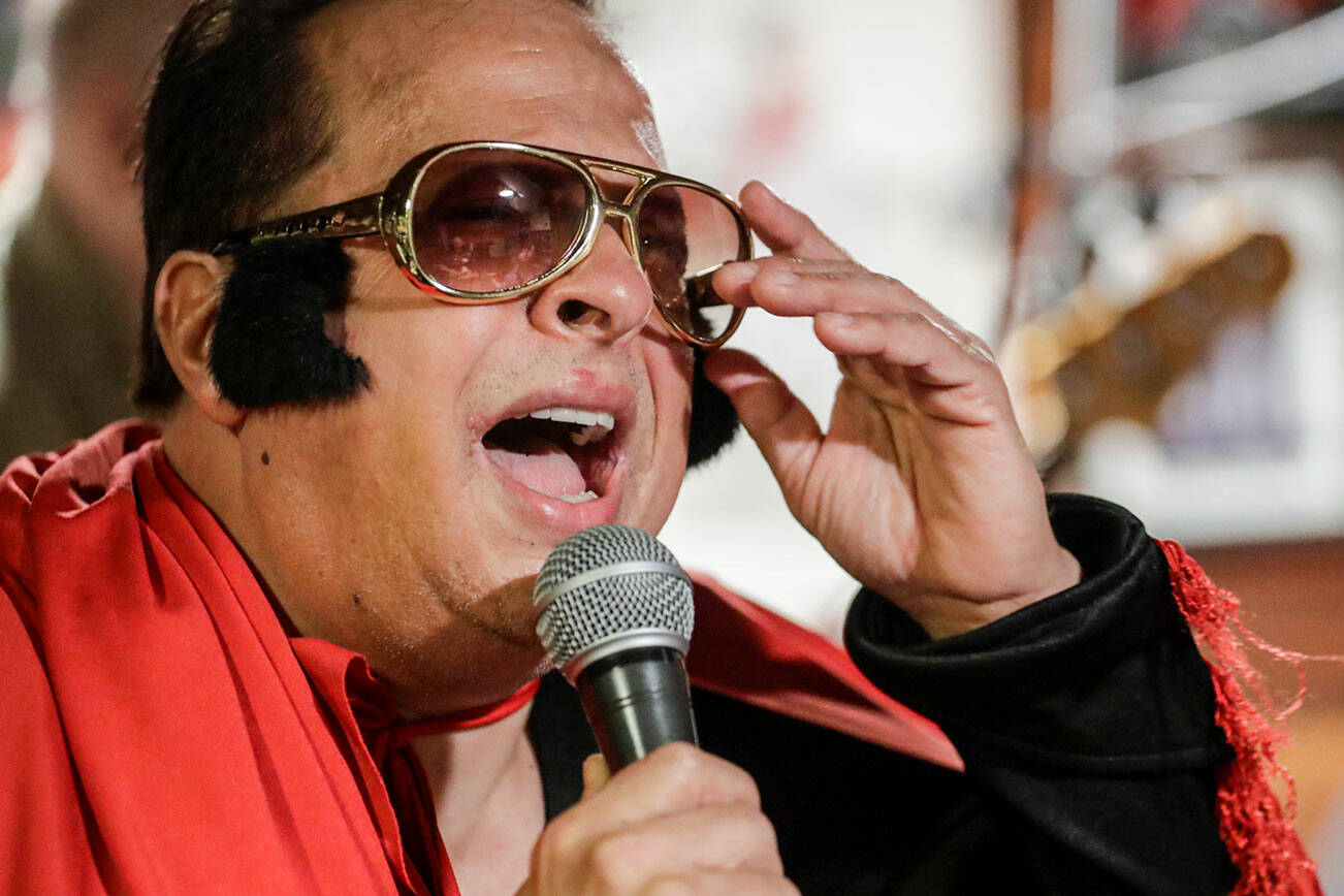 Gus Mansour sings during a rehearsal for the upcoming  annual Elvis Challenge Wednesday afternoon in Everett, Washington on April 13, 2022. (Kevin Clark / The Herald)