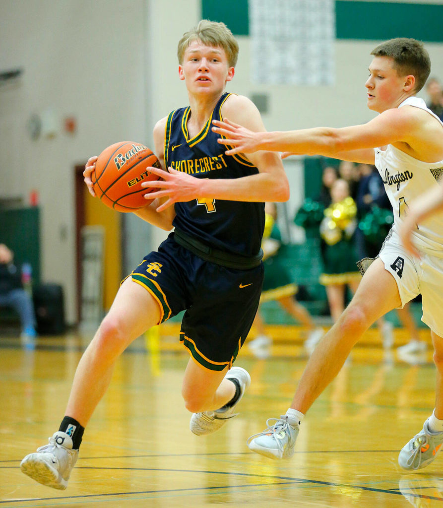 Shorecrest’s Anthony Najera tries to drive to the paint against Arlington on Wednesday, Feb. 15, 2023, at Jackson High School in Mill Creek, Washington. (Ryan Berry / The Herald)
