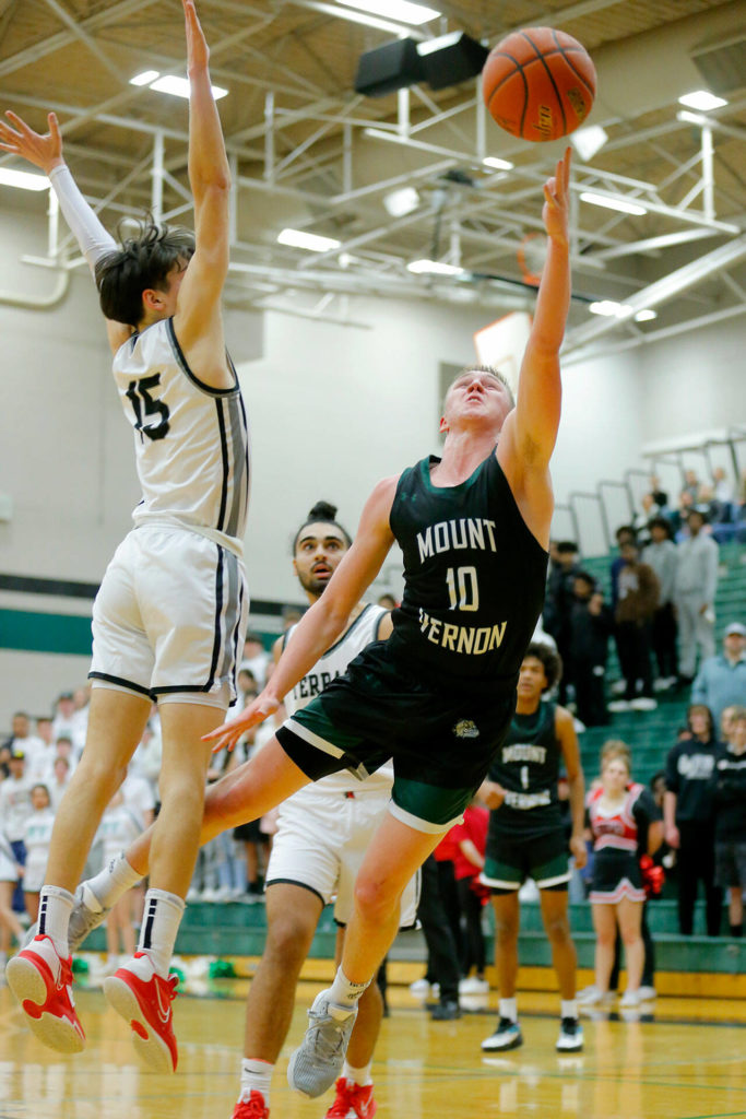 Mount Vernon’s Quinn Swanson tries to finish a layup against Mountlake Terrace on Wednesday, Feb. 15, 2023, at Jackson High School in Mill Creek, Washington. (Ryan Berry / The Herald)
