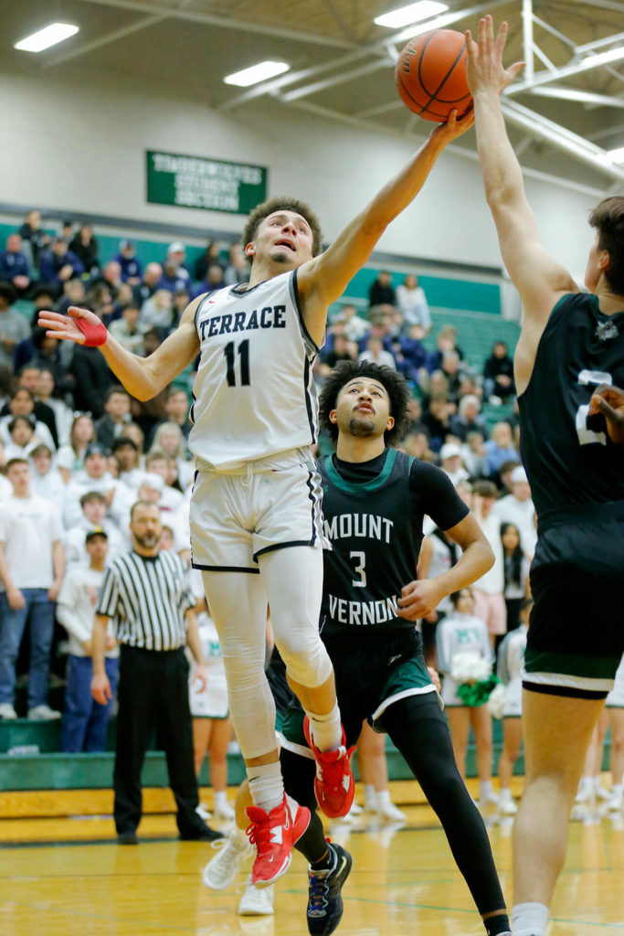 Mountlake Terrace’s Chris Meegan tries to score from the baseline against Mount Vernon on Wednesday, Feb. 15, 2023, at Jackson High School in Mill Creek, Washington. (Ryan Berry / The Herald)
