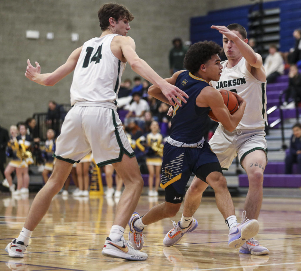 Mariner’s Macky James (3) moves with the ball during a game between Jackson and Mariner at Lake Washington High School in Kirkland, Washington on Thursday, Feb. 16, 2023. After an intense back-and-forth in the final period Mariner defeated Jackson, 77-76. (Annie Barker / The Herald)
