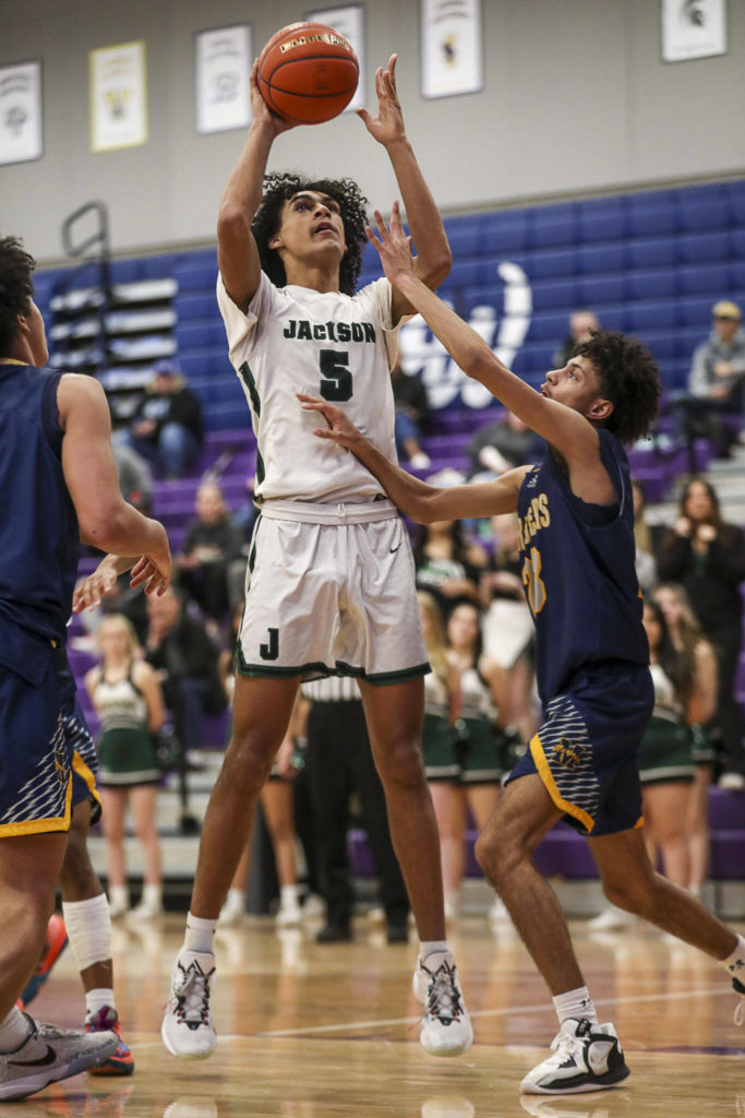 Jackson’s Sylas Williams (5) shoots the ball during a game between Jackson and Mariner at Lake Washington High School in Kirkland, Washington on Thursday, Feb. 16, 2023. After an intense back-and-forth in the final period Mariner defeated Jackson, 77-76. (Annie Barker / The Herald)

