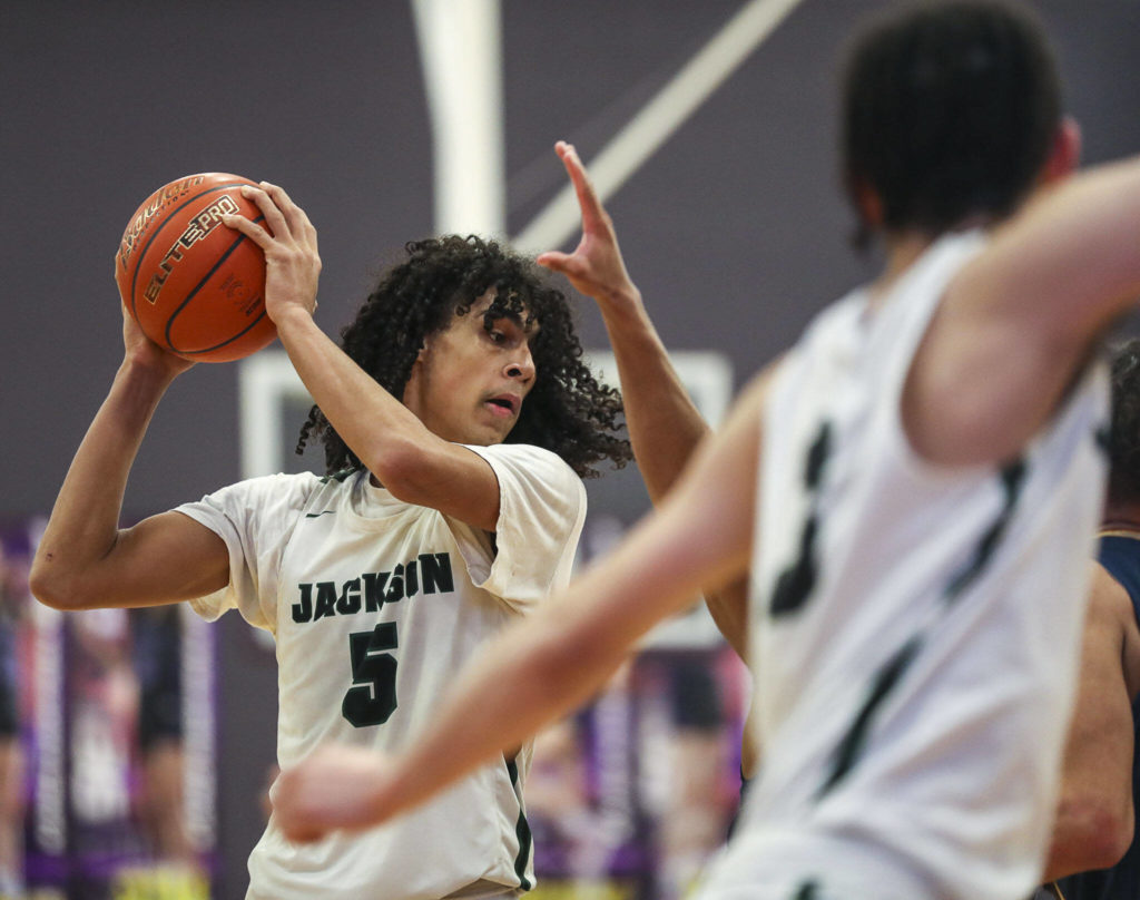 Jackson’s Sylas Williams (5) moves with the ball during a game between Jackson and Mariner at Lake Washington High School in Kirkland, Washington on Thursday, Feb. 16, 2023. After an intense back-and-forth in the final period Mariner defeated Jackson, 77-76. (Annie Barker / The Herald)
