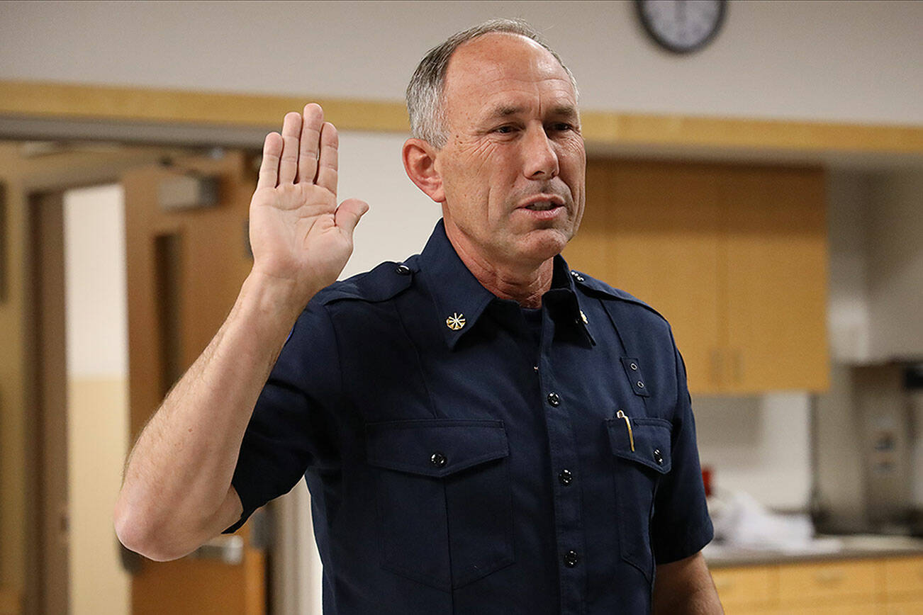 Fire Chief Ned Vander Pol being sworn in during the Marysville Fire District Board of Directors meeting on Wednesday, February 15, 2023 in Marysville, Washington. (Marysville Fire District)