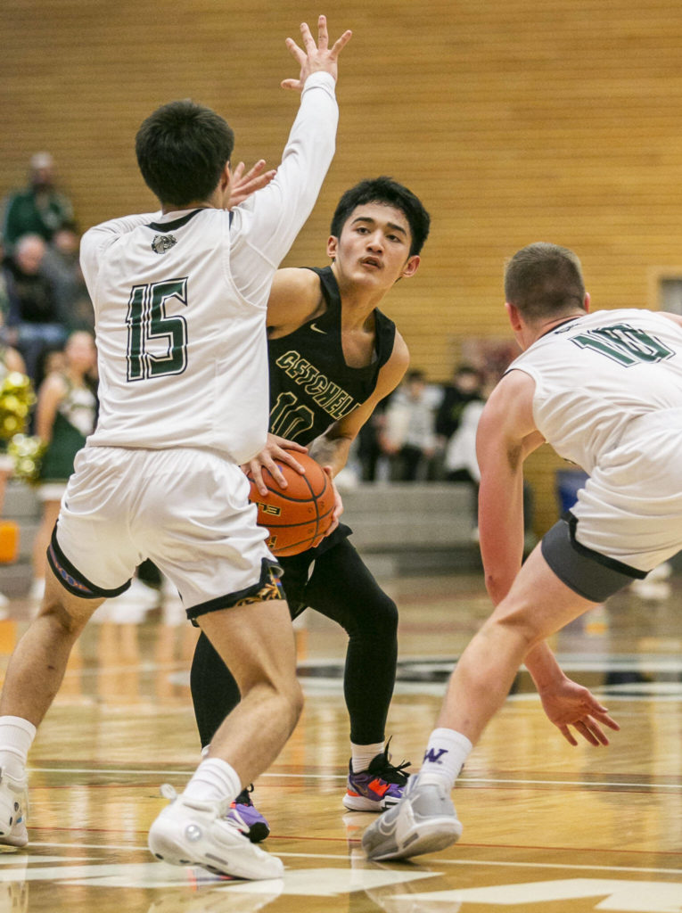 Marysville-Getchell’s Arion Palacol looks for an open teammate during the game against Mount Vernon on Friday, Feb. 17, 2023 in Everett, Washington. (Olivia Vanni / The Herald)
