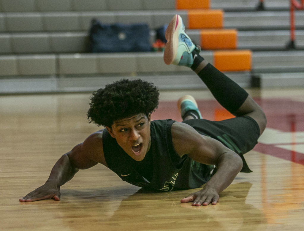 Marysville-Getchell’s Shawn Etheridge reacts to drawing a foul call during the game against Mount Vernon on Friday, Feb. 17, 2023 in Everett, Washington. (Olivia Vanni / The Herald)
