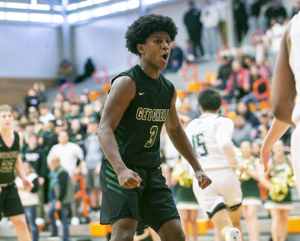 Marysville-Getchell’s Shawn Etheridge reacts to scoring during the game against Mount Vernon on Friday, Feb. 17, 2023 in Everett, Washington. (Olivia Vanni / The Herald)
