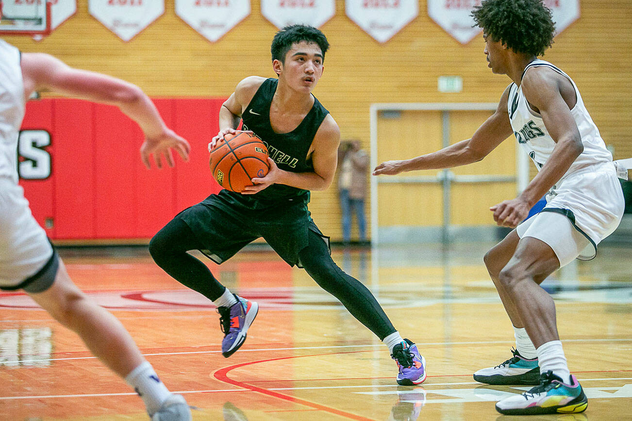 Marysville-Getchell’s Arion Palacol runs a play during the game against Mount Vernon on Friday, Feb. 17, 2023 in Everett, Washington. (Olivia Vanni / The Herald)