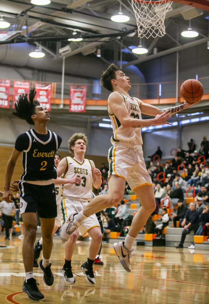 Shorecrest’s Parker Baumann makes an open layup during the game against Everett on Friday, Feb. 17, 2023 in Everett, Washington. (Olivia Vanni / The Herald)
