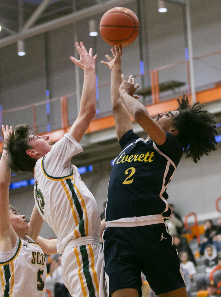Everett’s Isaiah White has his lay up blocked during the game against Shorecrest on Friday, Feb. 17, 2023 in Everett, Washington. (Olivia Vanni / The Herald)
