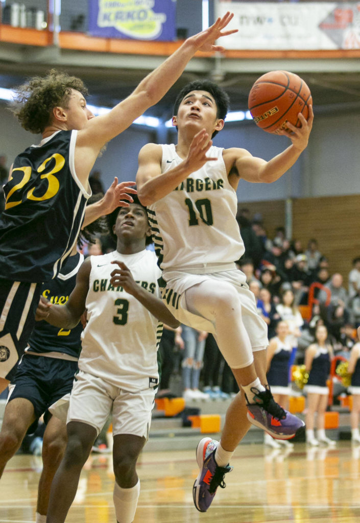 Marysville Getchell’s Arion Palacol attempts a layup during the game against Everett on Saturday, Feb. 18, 2023 in Everett, Washington. (Olivia Vanni / The Herald)
