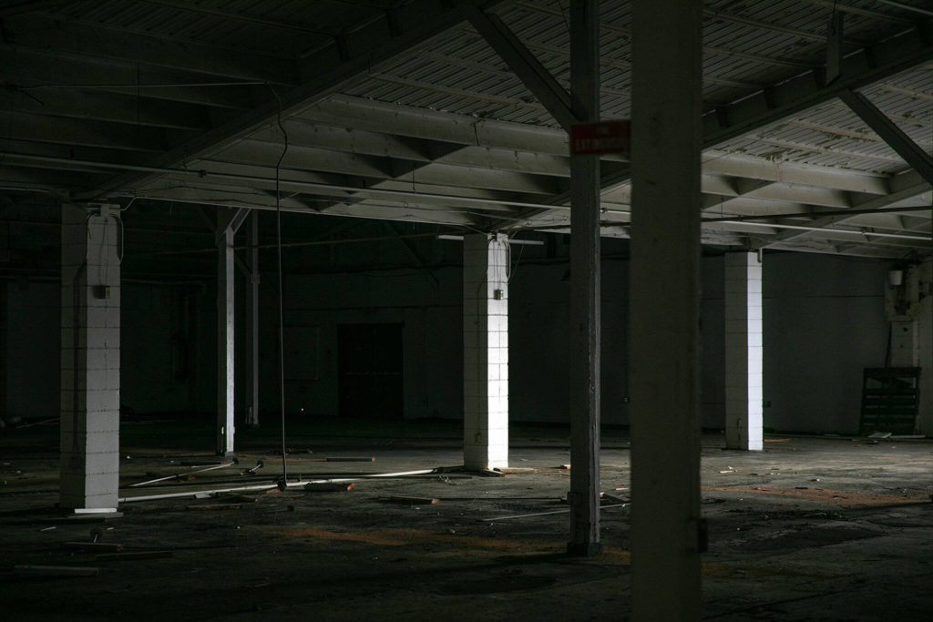 The inside of Commercial Building No. 400 is stripped bare prior to its impending demolition on Tuesday, at the Evergreen State Fairgrounds in Monroe. (Ryan Berry / The Herald)

