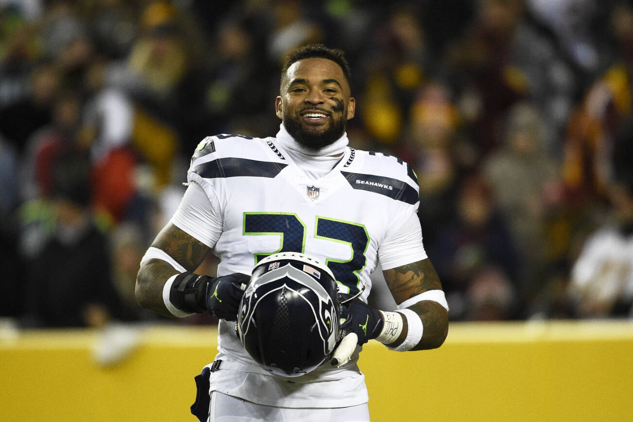 Seattle Seahawks safety Jamal Adams stands on the field during an NFL football game against the Washington Football Team, Monday, Nov. 29, 2021, in Landover, Md. (AP Photo/Mark Tenally)