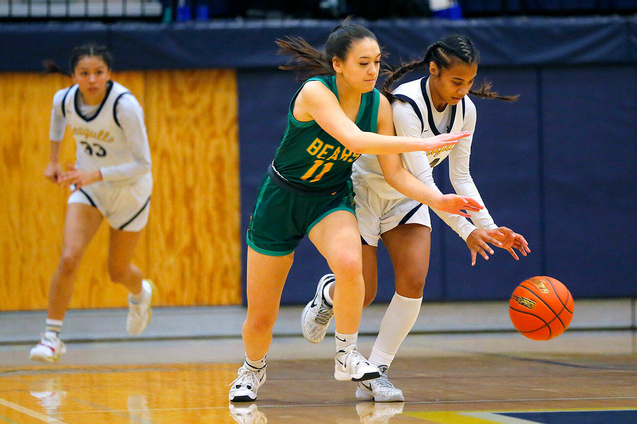 Everett’s Mylie Wugumgeg steals the ball against Bishop-Blanchet during a first round playoff game on Tuesday, Feb. 21, 2023, at the Norm Lowery Gymnasium in Everett, Washington. (Ryan Berry / The Herald)