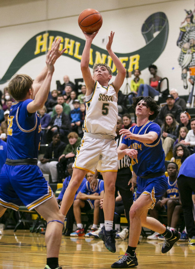 Shorecrest’s Brayden Fischer attempts a three-point shot during the game against Stadium on Tuesday, Feb. 21, 2023 in Shoreline, Washington. (Olivia Vanni / The Herald)
