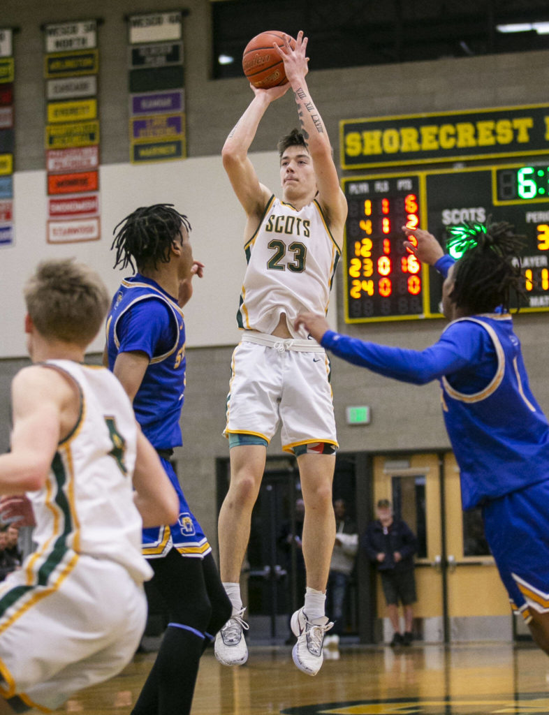 Shorecrest’s Parker Baumann attempts a three-point shot during the game against Stadium on Tuesday, Feb. 21, 2023 in Shoreline, Washington. (Olivia Vanni / The Herald)
