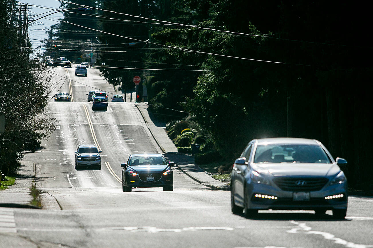 Cars move northbound along Ninth Avenue on Friday, Feb. 24, 2023 in Edmonds, Washington. (Olivia Vanni / The Herald)