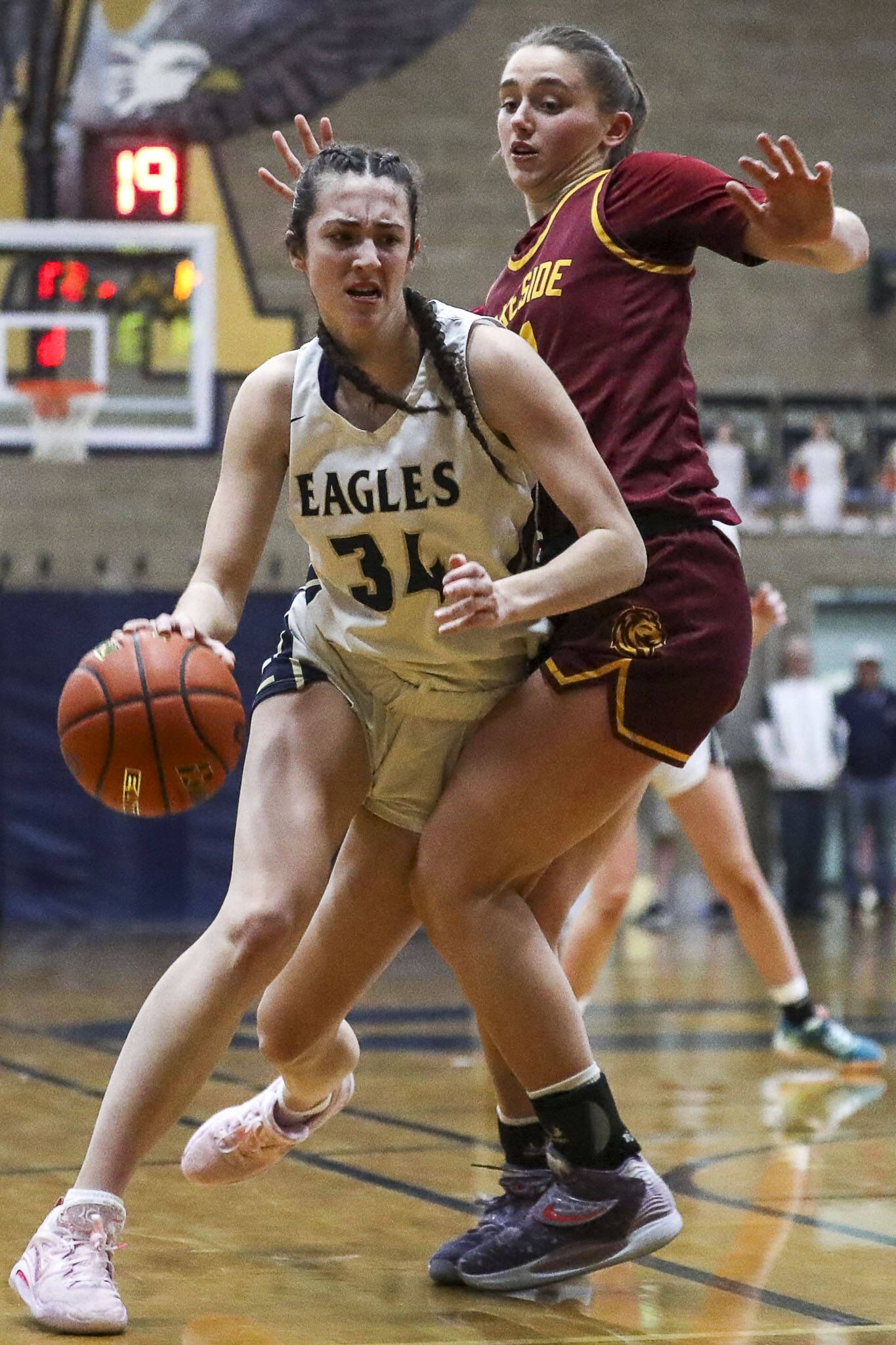 Arlington’s Jenna Villa (34) moves with the ball during a state playoff game against Lakeside at Arlington High School on Saturday. Arlington won 75-63. (Annie Barker / The Herald)