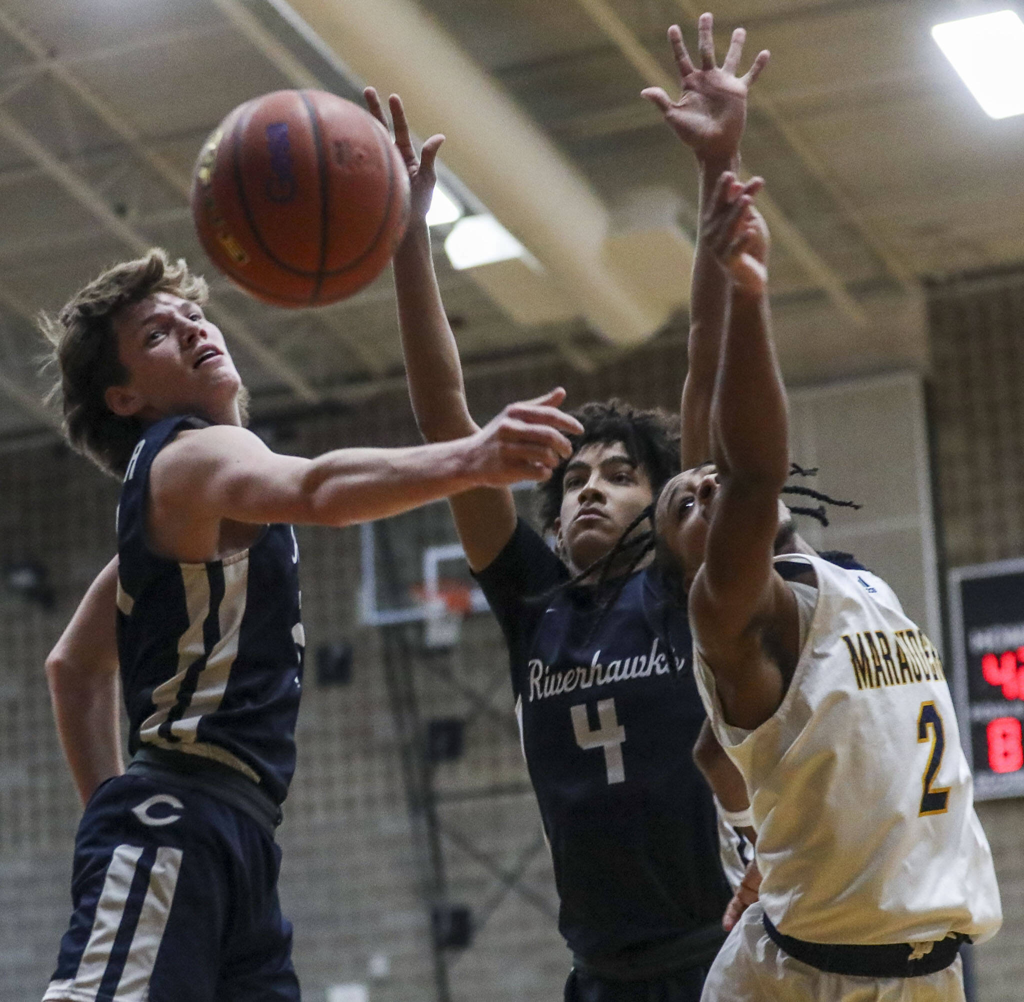 Mariner’s Jailin Johnson (2) shoots the ball during a state playoff game against Chiawana at Arlington High School on Saturday. Mariner won 85-74. (Annie Barker / The Herald)