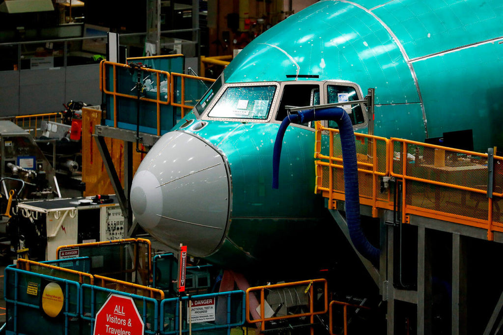 The nose of a Boeing 777 freighter is seen at Boeing’s Everett Production Facility on June 15, in Everett. (Jennifer Buchanan/The Seattle Times via AP, Pool)
