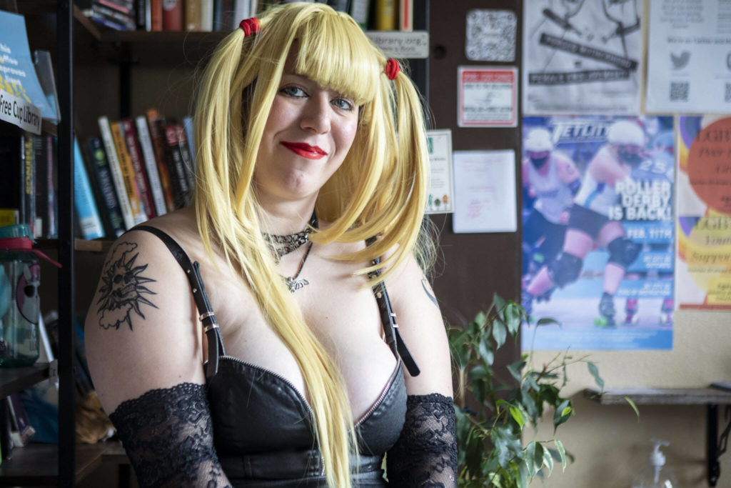 Arielle Kelton-Wafstet, 27, poses for a photo cosplaying as Misa from “Death Note” at Catalyst Café in Everett, Washington on Wednesday, Feb. 22, 2023. She will be attending Emerald City Comic Con this year. (Annie Barker / The Herald)
