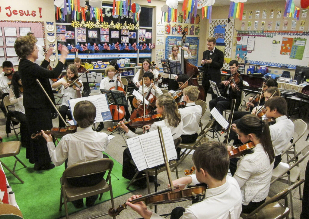 Cheryl Harris worked as a string coach for Edmonds, Mukilteo and Northshore school districts for decades. Her focus, her husband Bill Harris said, was “creating independent kids.” (Family photo)

