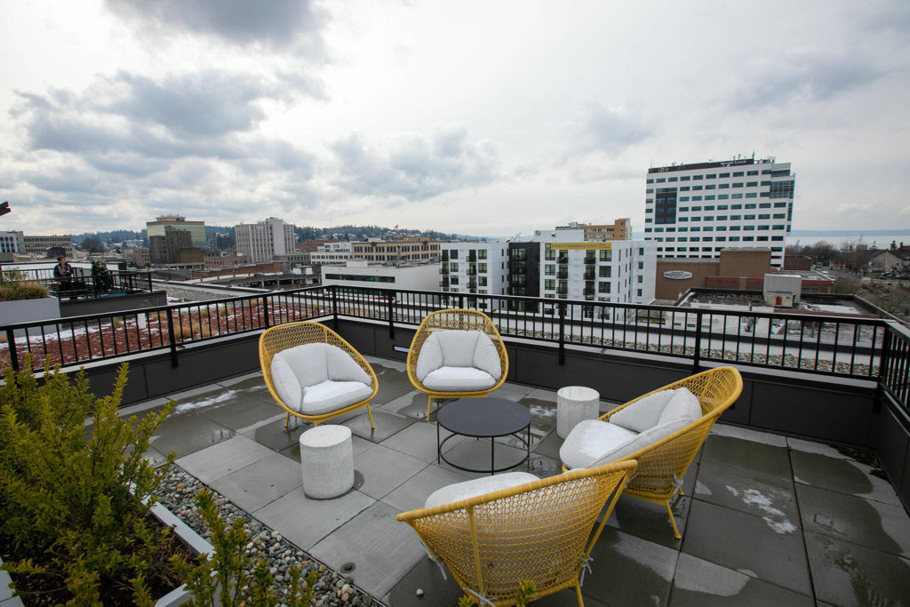 The rooftop at the Nimbus Apartments overlooks downtown and the waterfront Wednesday in downtown Everett. (Ryan Berry / The Herald)
