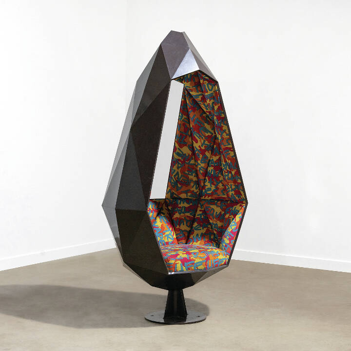This steel pod chair garnered extra interest from collectors due to its upholstery — a graffiti version of the Declaration of Independence designed by Stephen Sprouse for Knoll.