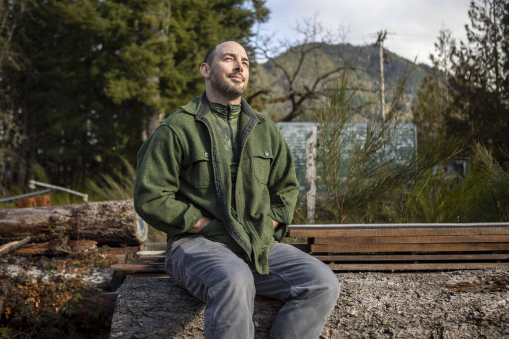 Glacier Peak Institute Executive Director Oak Rankin poses for a photo at 1405 Emens Ave N on Feb. 17 in Darrington. Environmental and outdoor education lessons are woven throughout the in-school and after-school activities in this small community, thanks to the Glacier Peak Institute. The non-profit arose from community concerns in the wake of the Oso landslide disaster. (Annie Barker / The Herald)
