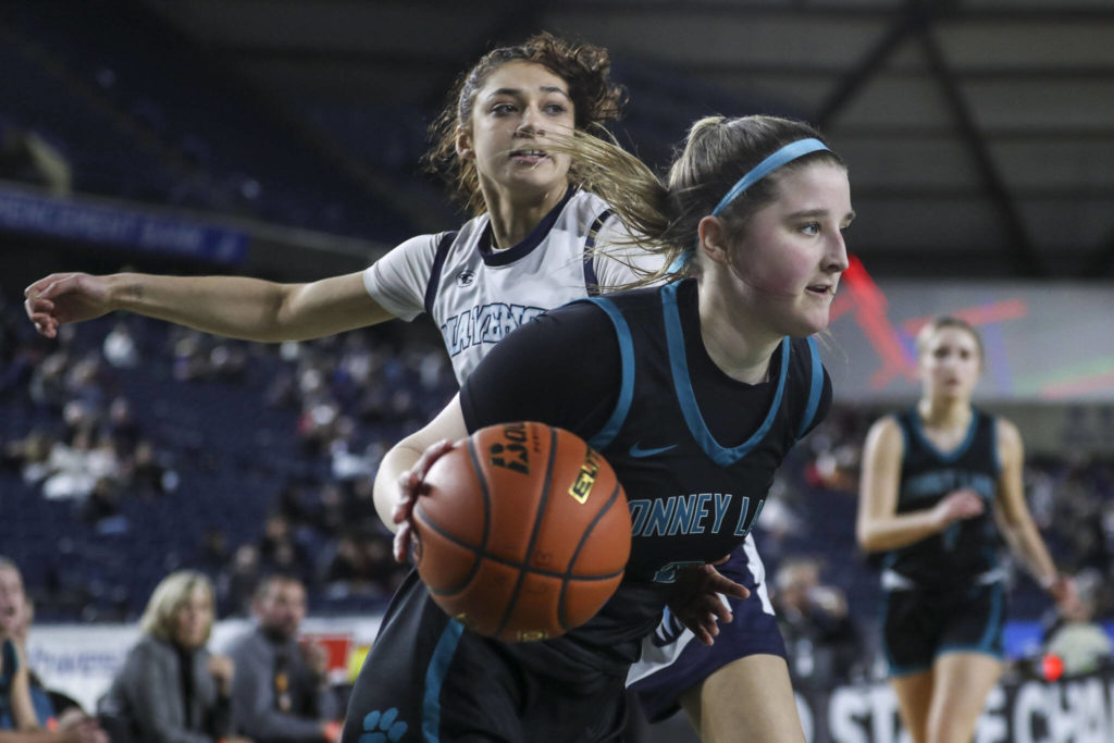 Bonney Lake’s Ava Bailey (2) moves with the ball during a 3A girls game in the Hardwood Classic between Meadowdale and Bonney Lake at the Tacoma Dome in Tacoma, Washington on Wednesday, March 1, 2023. Meadowdale won, 62-35.(Annie Barker / The Herald)
