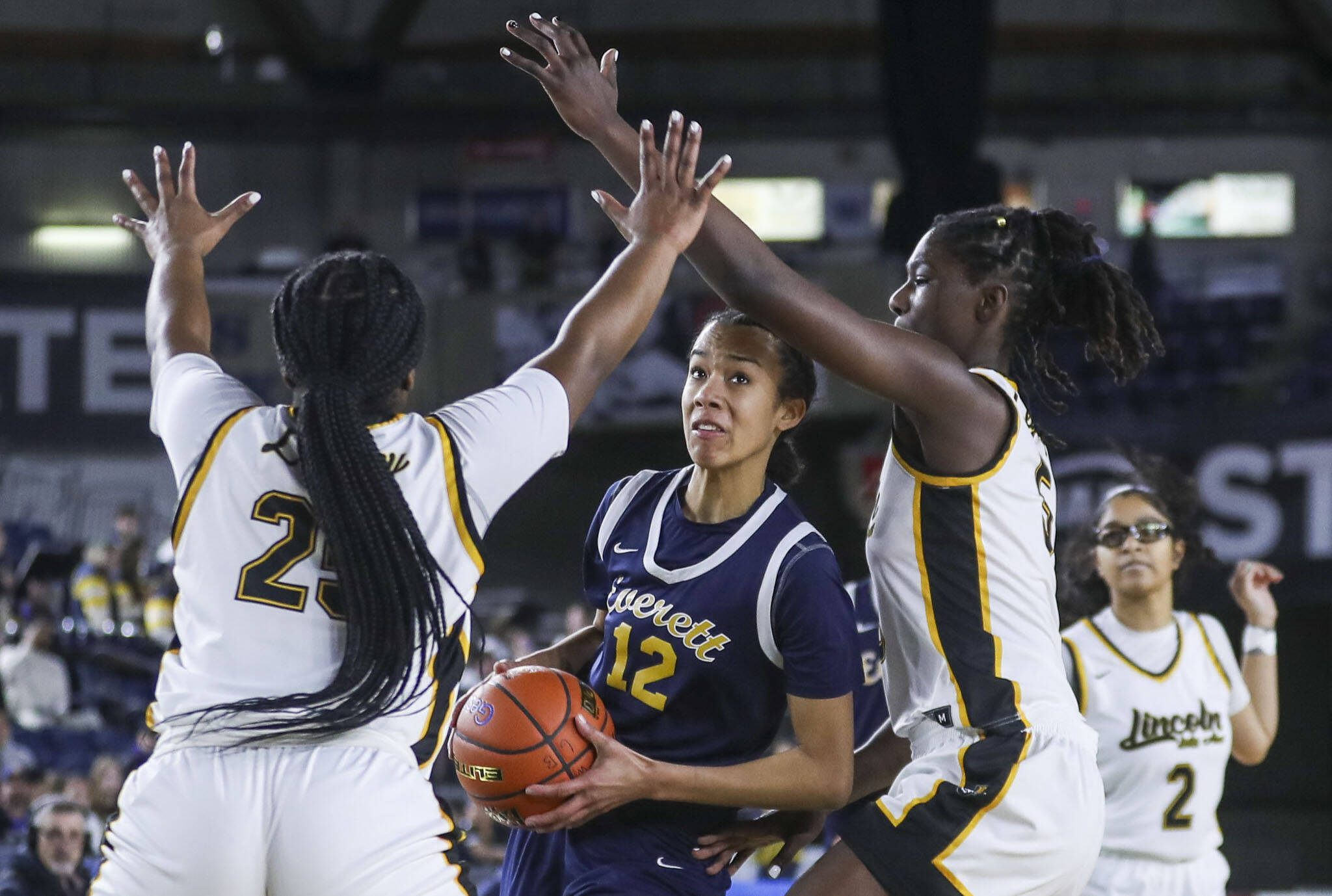 Everett’s Alana Washington (12) moves with the ball during a 3A girls game in the Hardwood Classic between Everett and Lincoln at the Tacoma Dome in Tacoma, Washington on Wednesday, March 1, 2023. Everett fell, 43-45. (Annie Barker / The Herald)