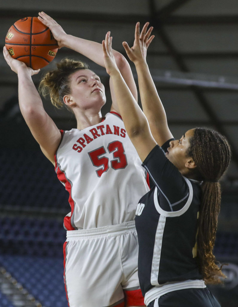 Stanwood’s Vivienne Berrett (53) shoots the ball during a 3A girls game in the Hardwood Classic between Lynnwood and Stanwood at the Tacoma Dome in Tacoma, Washington on Wednesday, March 1, 2023. Stanwood won, 74-69.(Annie Barker / The Herald)
